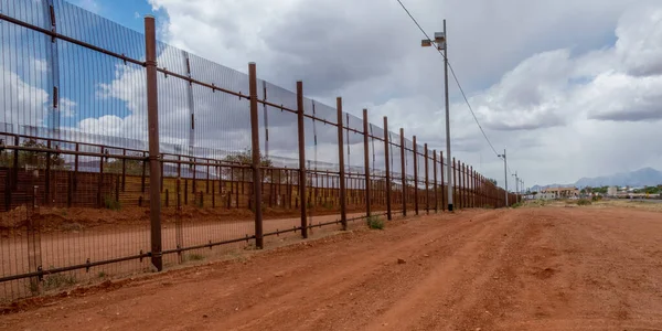 Fence along the border between Arizona and Mexico
