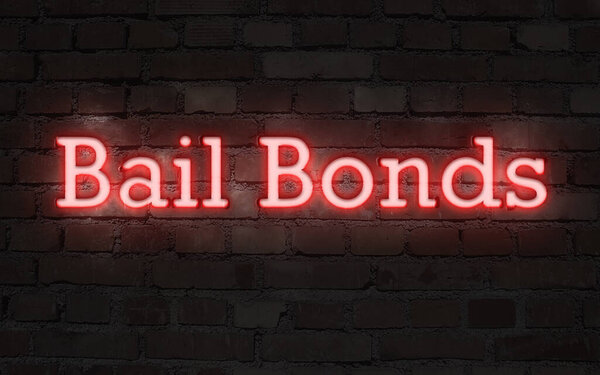 Neon sign on brick wall BAIL BONDS