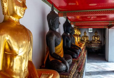 Statues at Wat Pho Buddhist Temple in Bangkok