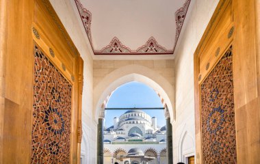 Spectacular view of Istanbul Camlica Mosque from entrance door. Camlica Mosque (Turkish: Camlica Camii) is a mosque located in Istanbul and the largest mosque in Turkey. clipart