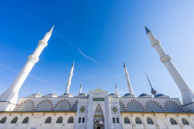 The minarets of an incredibly beautiful newly-opened Camlica Mosque in the clear spring sky of Istanbul. Camlica Mosque is the largest mosque in Turkey.