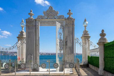 Dolmabahce Palace gate to the Bosporus. Dolmabahce is the largest palace and one of the most important historical monuments in Istanbul, Turkey. clipart
