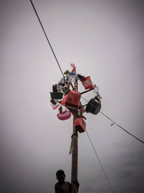 the excitement of children and adults taking part in the areca climbing competition to enliven the independence day of the republic of Indonesia, east kalimantan, indonesia, august, 14,2022