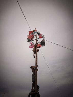 the excitement of children and adults taking part in the areca climbing competition to enliven the independence day of the republic of Indonesia, east kalimantan, indonesia, august, 14,2022