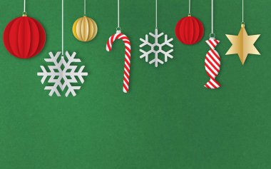 Yeşil arka planda noel süslemeleri