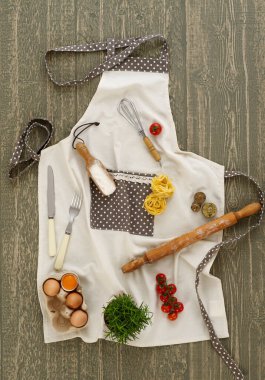 Kitchen apron with ingredients and props