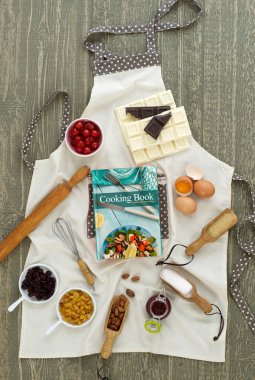 Kitchen apron with ingredients and props