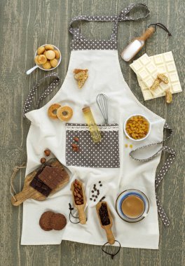 Kitchen apron with ingredients and props