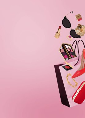 Pembe arka planda uçan kadın aksesuarları