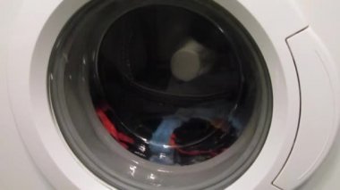 Clothes are being washed in the washing machine