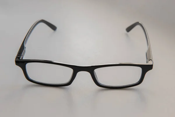 Black Glasses Gray Background — Photo