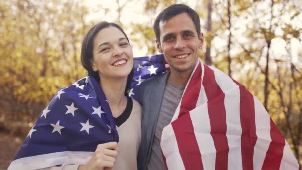 Happy american family with flag of USA — Stock Video
