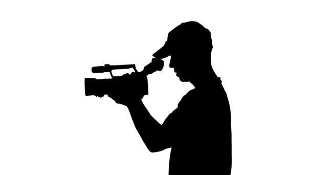 Silhouette of a man in a video camera — Stockvideo