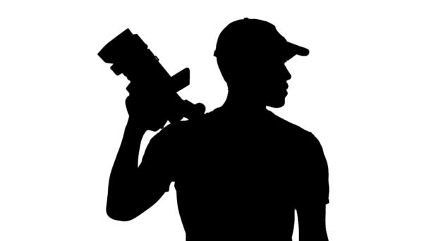 Portret van een man met camcoder — Stockvideo