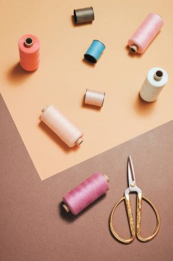 Creative DIY concept with threads,  needles,scissors and measuri