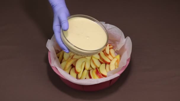 Poured dough mixture for making apple pie. — Stockvideo