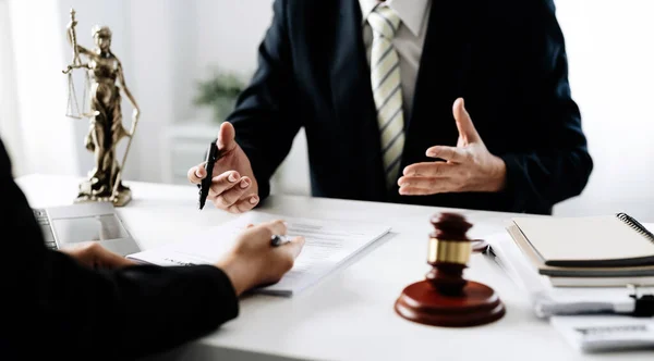 Law concept, lawyer man hoding pen with contract or agreement document to customer for signing in courtroom legal — Stok fotoğraf
