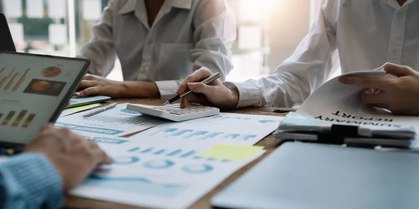Business team colleagues discussing working analysis with financial data and marketing growth report graph in team, Meeting Talking Brainstorming Communication Concept — Stock Photo, Image