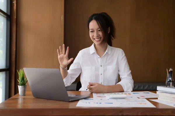 Young Happy Successful Employee Business Asian Woman Waving Hand Sit — 스톡 사진
