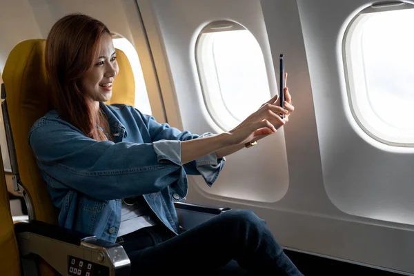 Beautiful Asian Woman Take Selfie Mobile Phone Airplane — 图库照片
