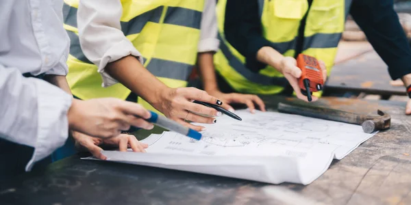 Three Colleagues Discussing Data Working Architectural Project Construction Site —  Fotos de Stock