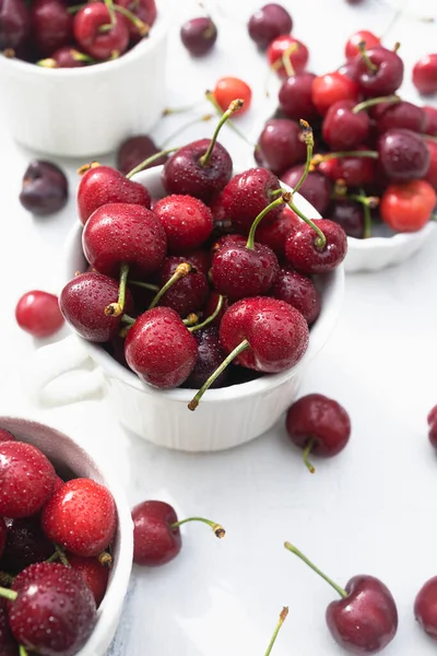 Delicious Cherries White Ceramic Cups White Wood Table Stock Image