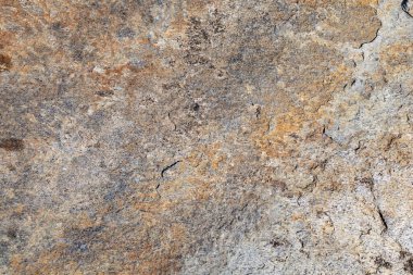 Rough stone texture. Stone facade detail of a house. Hard and rough material