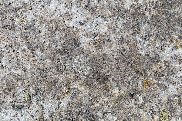 Rough stone texture. Stone facade detail of a house. Hard and rough material