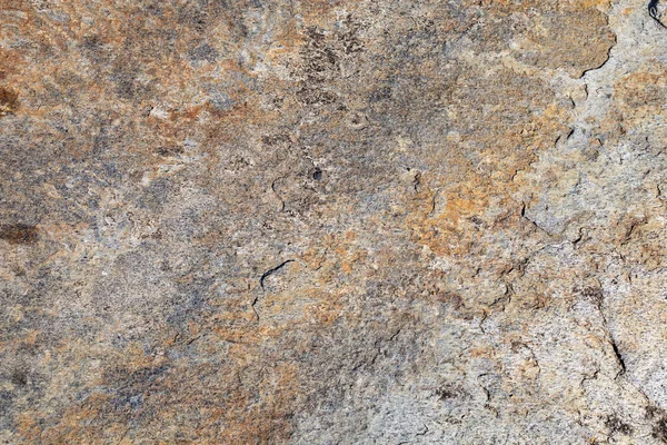 Rough stone texture. Stone facade detail of a house. Hard and rough material