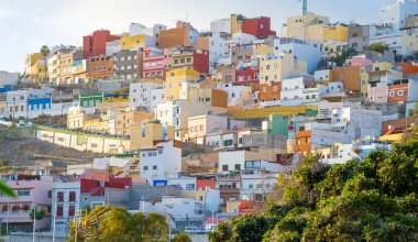 February 20 2022-Las Palmas de Gran Canaria many colorful houses in Ciudad alta, in old city . clipart