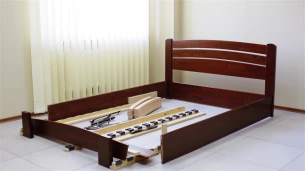 Installation Double Wooden Bed Transforming Frame — Stock Video
