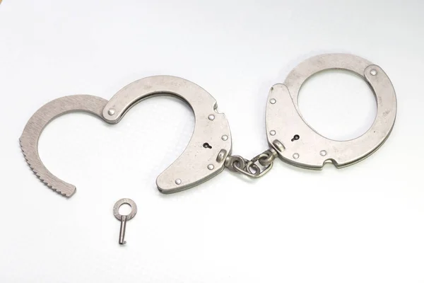 Handcuffs Key Form Heart White Background — Stock Photo, Image