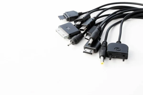 Different Types Charger Connectors Phones White Background — Stockfoto