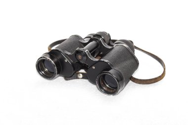 old binoculars with strap on white background