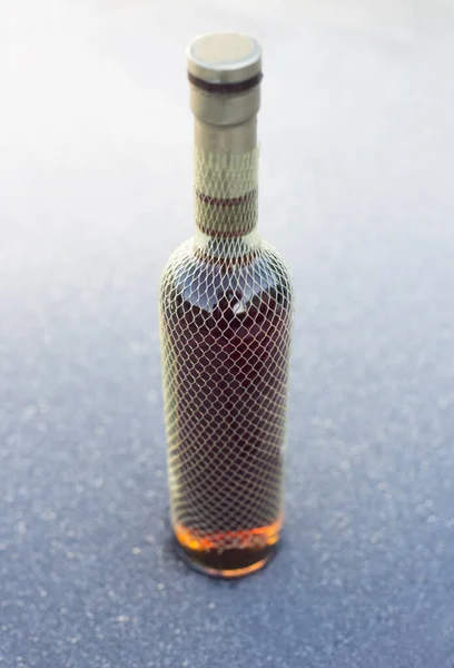 Bottle Cognac Hoarfrost Surface — стоковое фото