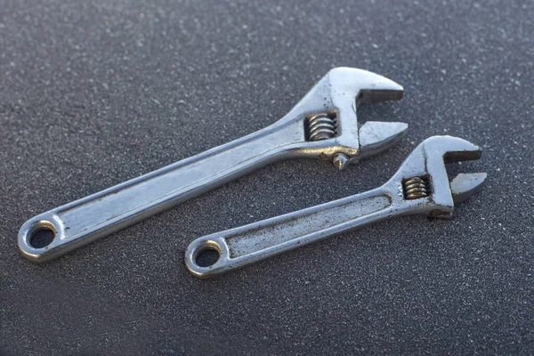Adjustable Wrenches Frozen Surface — Stock Photo, Image