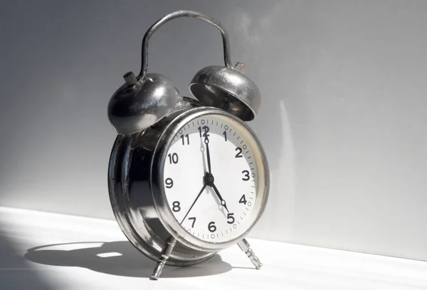 Small Metal Alarm Clock White Windowsill Time Clock — стоковое фото