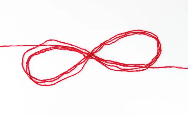 Infinity Sign Red Woolen Threads White Background — Stock Photo, Image