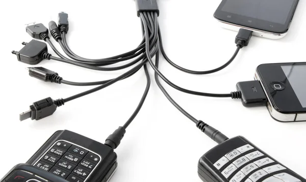 Phones Connected Different Types Charger Connectors Isolated White Background — Foto de Stock