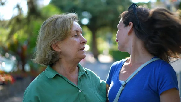 Woman Untying Hair Adult Daughter Posing Photo Mother Shakes Hair — Stok fotoğraf