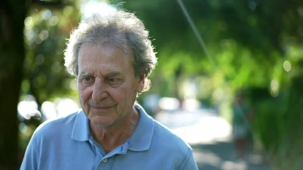 Smiling Senior Man Walking Green Path One Happy Older Person — Zdjęcie stockowe