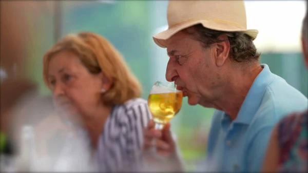 Older Man Drinking Beer Candid Senior Drinks Draft Beer Restaurant — Fotografia de Stock