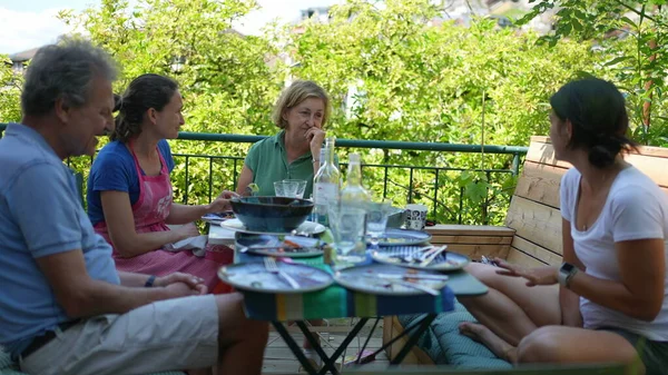 Family Sitting Table Lunch Conversation Summer Day — Foto de Stock