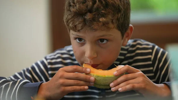 Child Eating Melon Fruit Pensive Kid — Stockfoto