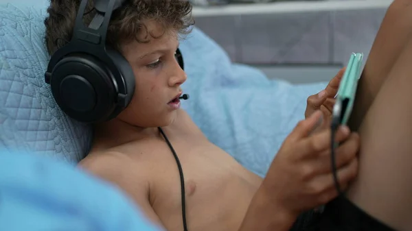 Preteen Boy Playing Tablet Online Wearing Headset — Photo