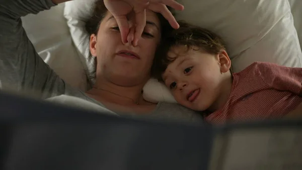 Playful Mother Telling Bedtime Story Child Son Lying Bed Imitating — Stock Photo, Image