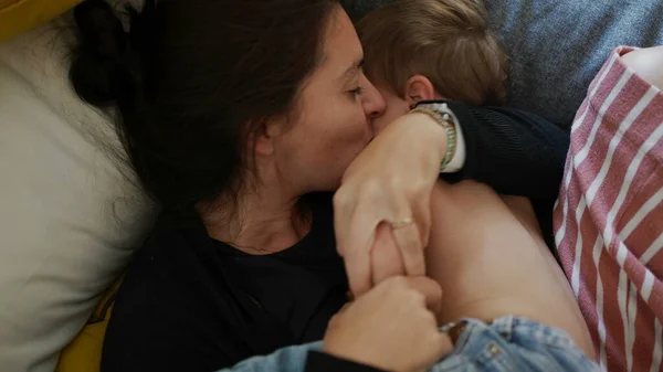 Loving Mother Covering Baby Child Kisses Casual Candid Mom Love — Stock Photo, Image