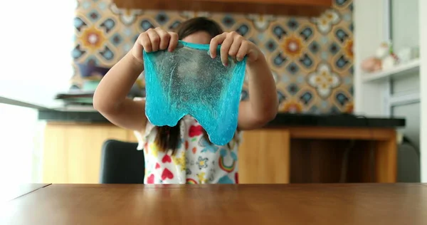 Little Girl Playing Slimy Plasticine Creating Bubble Blue Slime — Stockfoto