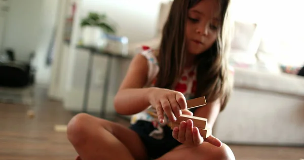 Little Girl Playing Building Wooden Blocks Home —  Fotos de Stock