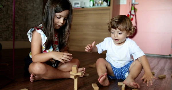 Children Playing Tower Wooden Blocks Home —  Fotos de Stock